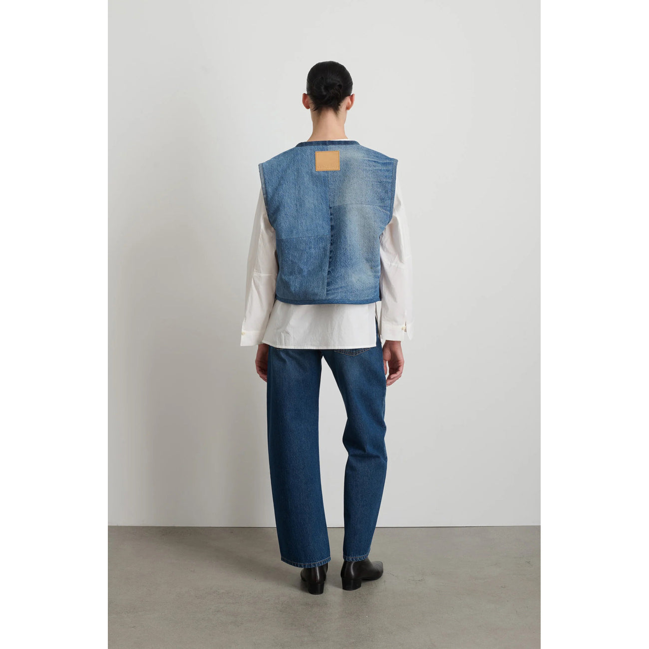 reversible denim sherpa vest in grey blue