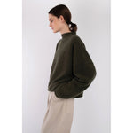 rolled sweater in dark olive boucle